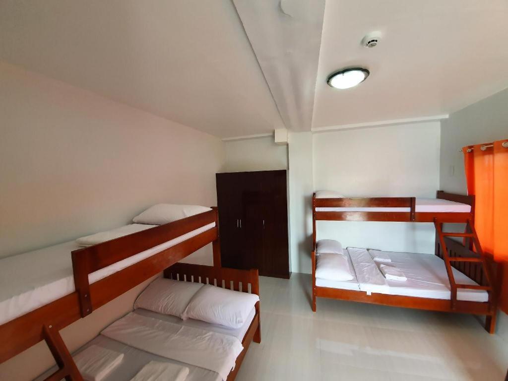 Хостел Lufian Dormitel Dumaguete City Экстерьер фото